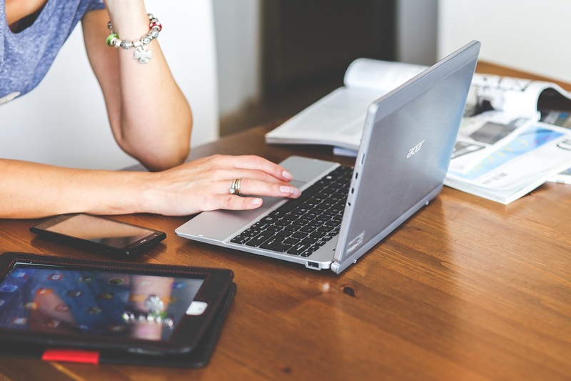 Woman Using Laptop - Challenges and Solutions in Software Localization